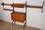 Stunning modular Scandinavian wall-mounted bookcase from the 1960s, produced by Blindheim Møbelfabrik in Norway. This wall...