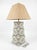 Add a touch of global artistry and sophisticated texture to your living space with this striking vintage table lamp,...