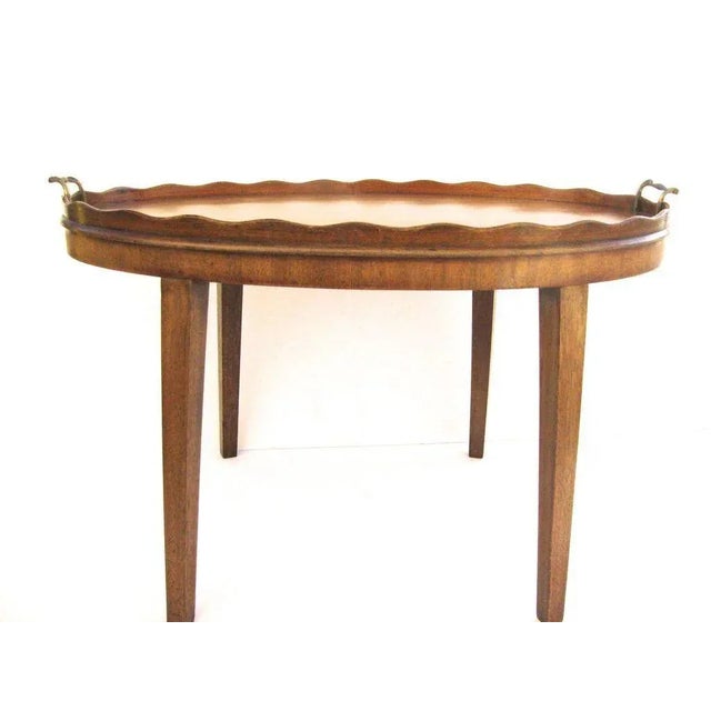 English 19th century mahogany oval tray with custom base. Wavy gallery edge, brass handles. 31" x 19" x 19"