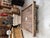 This large coffee table was crafted from an old cider press, giving it a rugged, authentic look. Lovely traces of its past...
