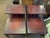 Pair of Mid Century vintage step tables with brass cap feet and line inlay, marked Lane Furniture Company. A standard...