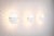 An iconic set of three "Giovi" wall lamps, designed by the legendary Achille Castiglioni in 1982 for Flos, Italy....