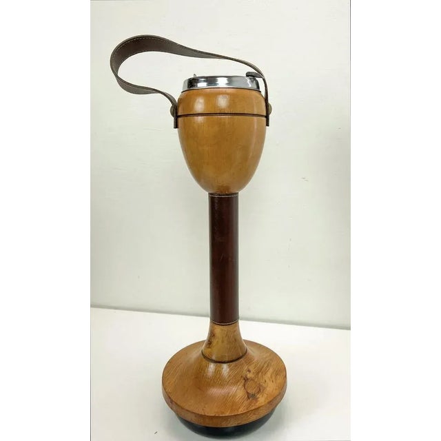 A very stylish Danish Mid-Century standing ashtray made of hardwood and leather. Very nice and sturdy vintage design 4.1...