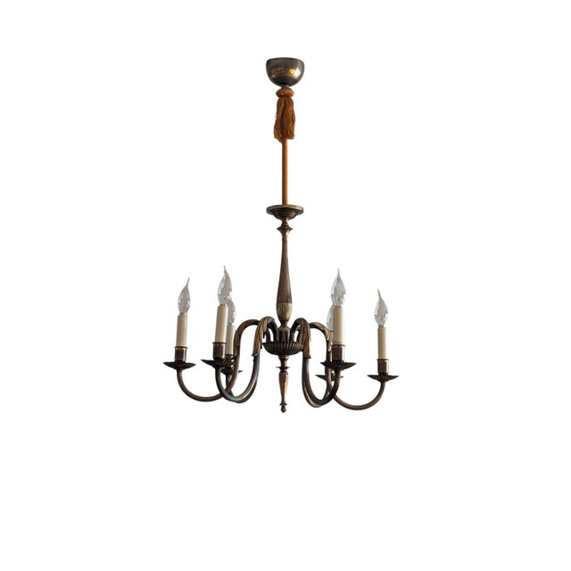 This lamp designed by Paavo Tynell is a magnificent example of the golden age of Finnish design, when brass and skilled...