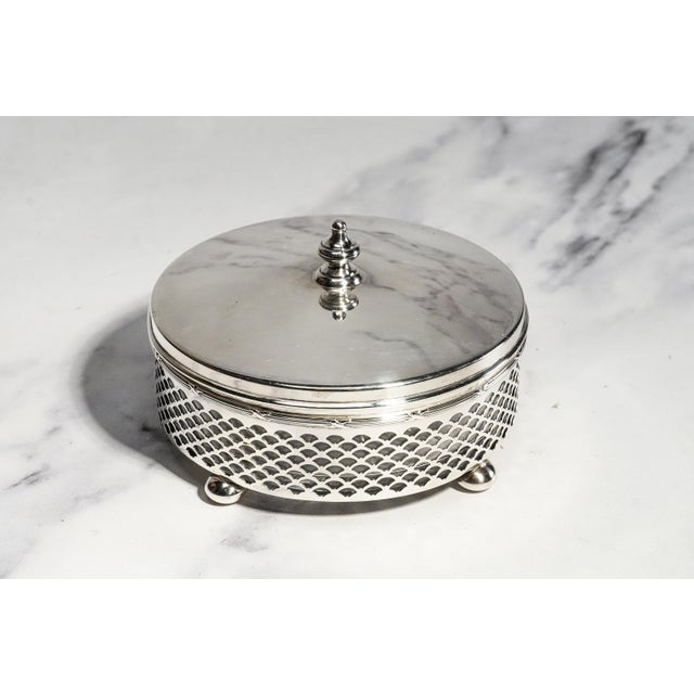 An exquisite example of early 20th-century American luxury, this antique Tiffany & Co. sterling silver and crystal jewelry...