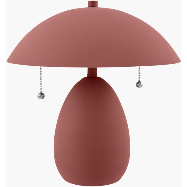 Illuminate your space with the charming allure of the Umberis accent table lamp, a perfect embodiment of traditional...