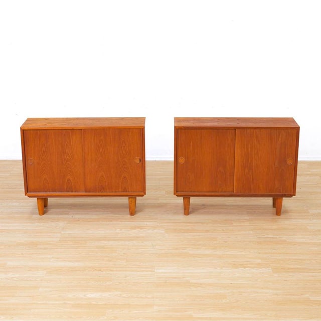 These vintage mid-century cabinets were produced in Denmark during the 1960s and are attributed to kai Kristiansen. These...