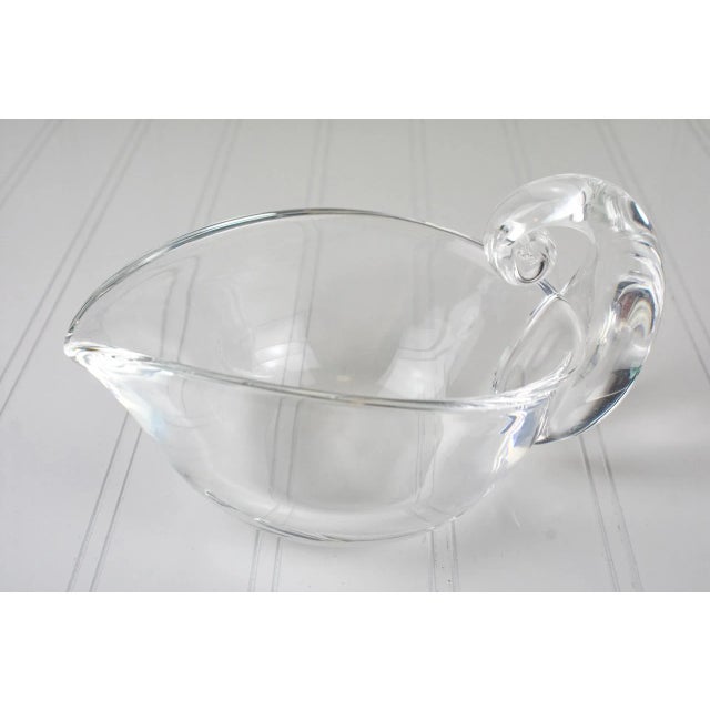 Original 1940s crystal glass Steuben gravy boat, sauce bowl that has a pour spout. Has the iconic rolling scroll handle...
