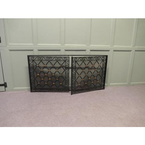 Large Fixed Wrought Iron Fire Guard The Frame of this sturdy Fireguard fixes to the wall and opens out to both sides from...
