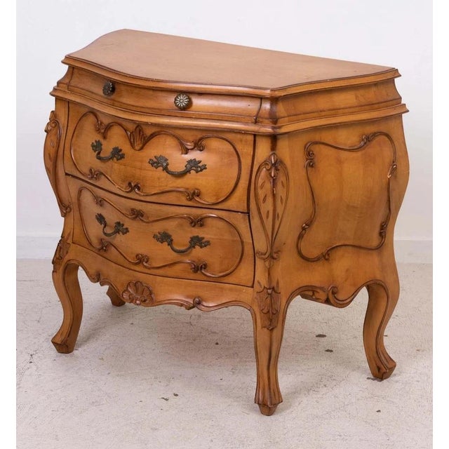 Italian three drawer bombe commode. Made in Italy stamped on wood back. One small drawer on top of two larger drawers....