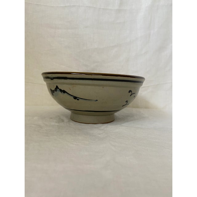 Asian serving bowl rescued from an estate sale. It's in great vintage condition!