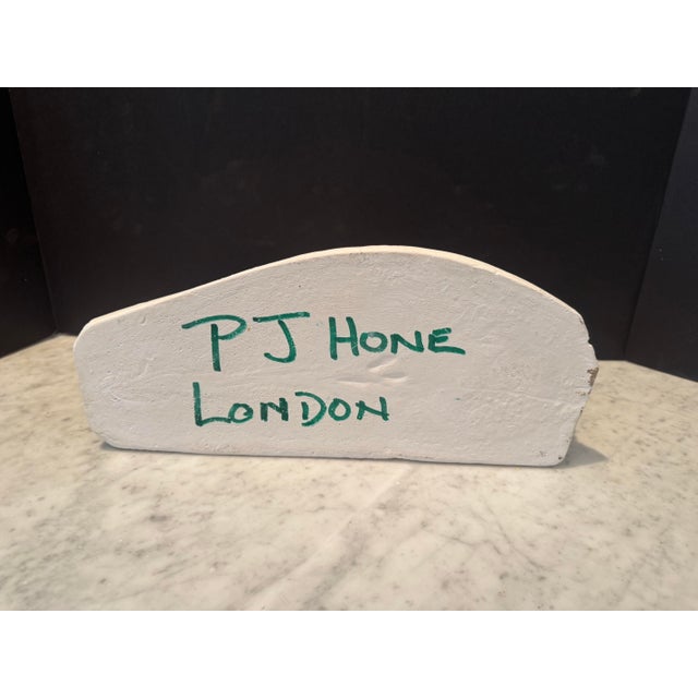 A plaster rendering of a Roman foot by PJ Hone, London. Great detail throughout. Fab in a bookcase!