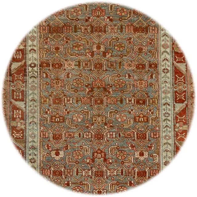 Beautiful antique Persian Malayer runner rug, hand-knotted wool with a light blue field, tan and ivory accents in an all-...