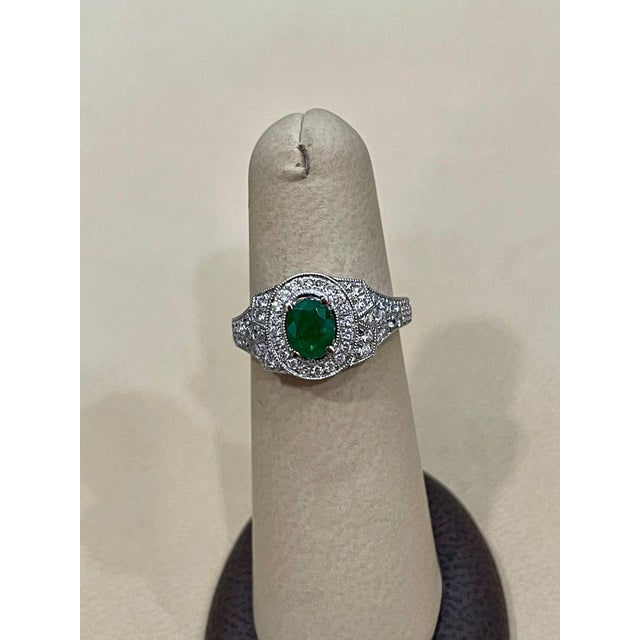 Gemstone 0.80 Carat Oval Cut Emerald and 0.85 Carat Diamond Ring 18 Karat White Gold For Sale - Image 7 of 18