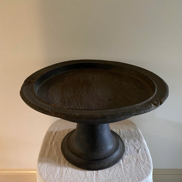 Antique circa 1880-1910 hand carved/turned wooden raised tray from Indonesia. Solid teak wood Used to offer food and...