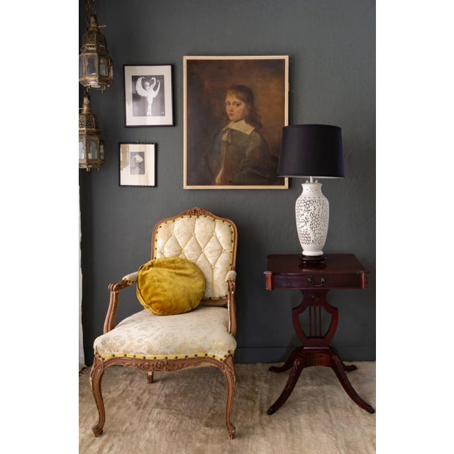 A set of two Mersman mahogany side tables or nightstands features a harp and lyre base and four graceful legs carved with...