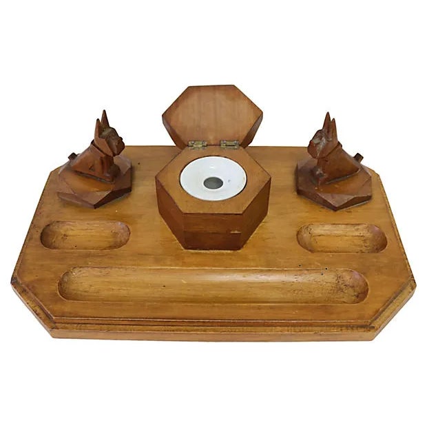Midcentury Art Deco hand-carved Scottie dog inkwell and desk set. Original porcelain inkwell liner. No maker's mark. Light...