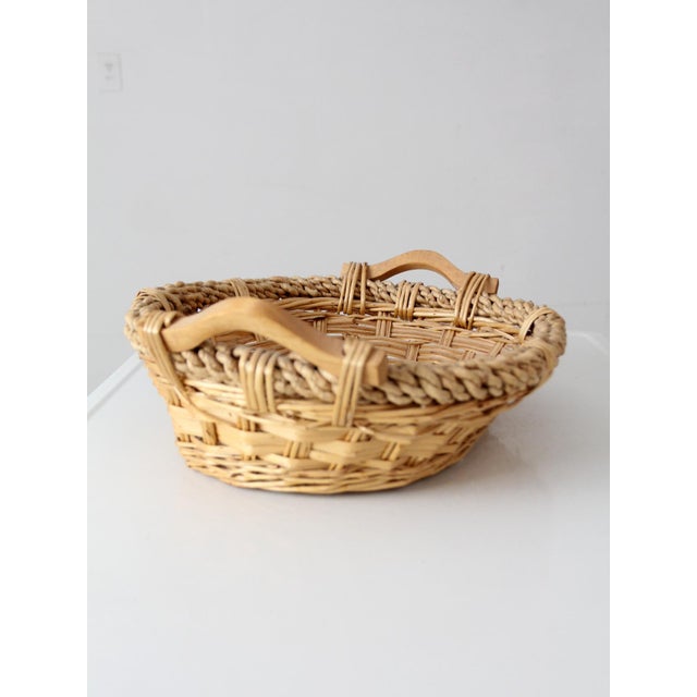 Contemporary Vintage Wicker Catchall Basket With Wooden Handles For Sale - Image 3 of 10