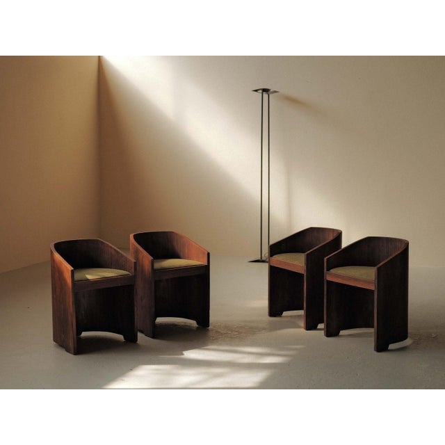 This elegant set of four Art Deco armchairs, dating to around 1930, is crafted in veneer. The design is clean and almost...