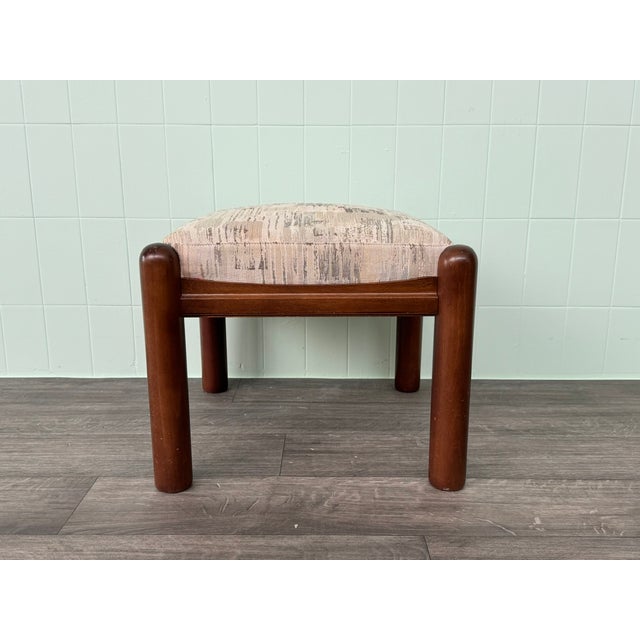 Pouf footrest made in Italy and dating back to the 1970s. The structure is made of wood and the seat is padded and...