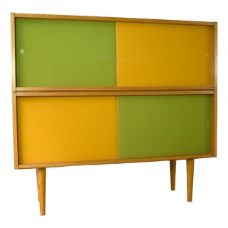 Vintage Sideboard with Glass Sliding Doors from Veb Deutsche Werkstätten Hellerau, 1970s For Sale