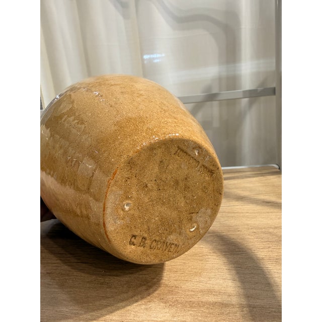 A lovely stoneware vase with a crackle glaze and ruffled top edge, this C B Craven Tobacco Road vase was part of the Peggy...