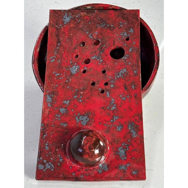 Red Glazed Ceramic Sculptural Object A visually arresting ceramic sculpture by Italian artist Renato Bassoli, embodying...