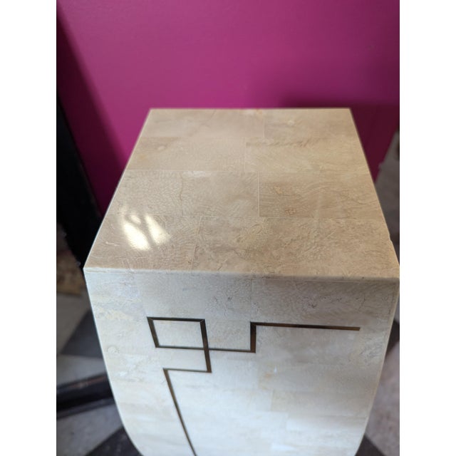Vintage Maitland Smith Tessellated Stone Pedestal with gold inset brass accent. Contemporary style with a unique shape....