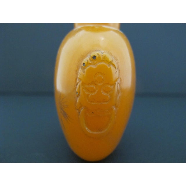 Chinese Erotic Orange Engraved Mock Mask Ring Handle Snuff Bottle For Sale - Image 11 of 11