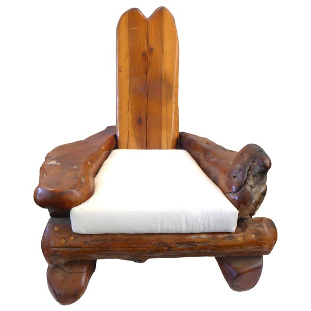 A fantastic, massive California craft redwood lounge chair. An outstanding element of monumental proportions; a frame...