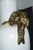 Statement-scale white ceramic urn lamp with dramatic sculptural gilt-brass handles that curl at the shoulders and drop...