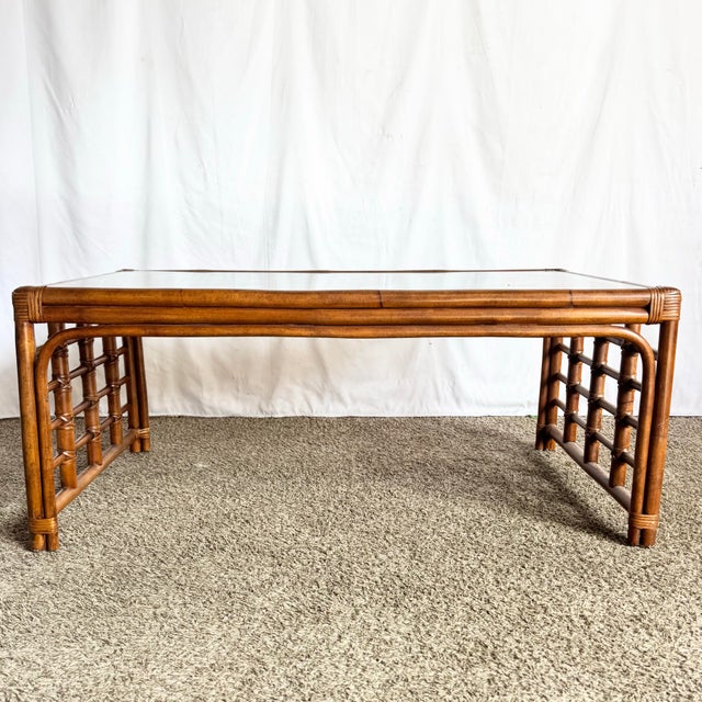 This Boho Chic rattan and wicker inlaid coffee table captures the relaxed elegance of vintage coastal interiors. Crafted...