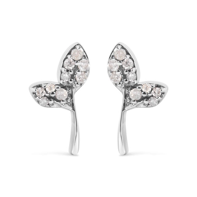 Embrace the whisper of luxury with these exquisitely crafted earrings, each shaped into a slender leaf from luminous 925...