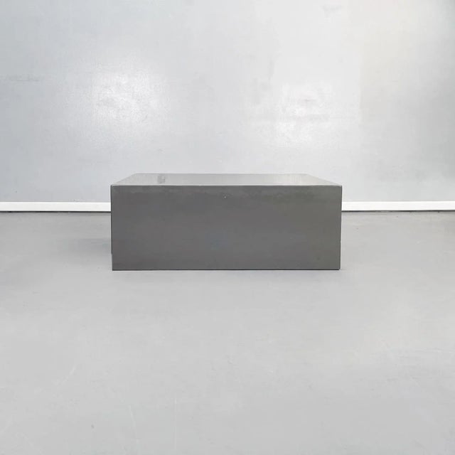 Coffee table in the shape of a parallelepiped with rounded corners, in gray lacquered wood. Produced by Azucena in 1960s...