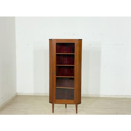 For sale is a beautiful vintage corner cabinet from the 1960s. Made of teak, the cabinet impresses with its timeless...