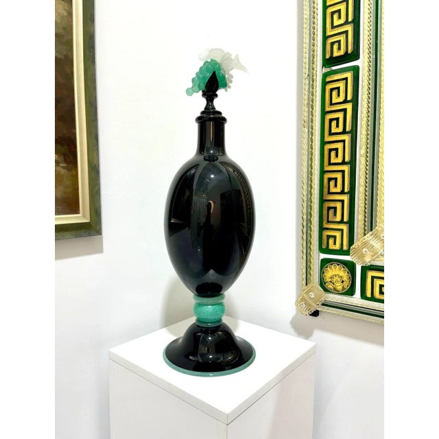 Awesome vase with stopper. The grape cluster is truly beautiful and is very difficult to accomplish. Normally this vase...