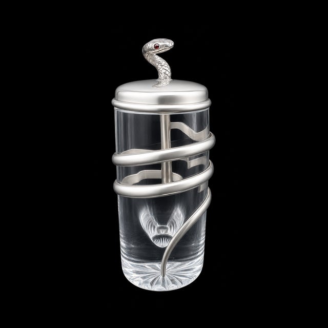 This rare Tiffany & Co. sterling silver and crystal perfume bottle (1891–1902) is a sculptural jewel of Art Nouveau...