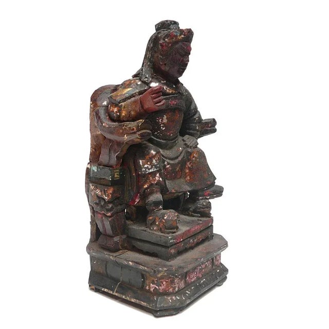 Elevate your space with this stunning, hand-carved vintage statue, a true testament to traditional artistry. This...