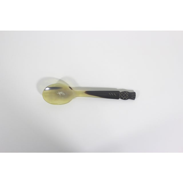 Vintage hand carved horn spoon with a Scottish thistle on the handle (I think they look like pineapples). Excellent...
