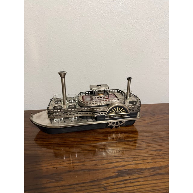 Charming vintage Natchez Mississippi Riverboat drink caddy and music box, designed in the form of a classic paddlewheel...