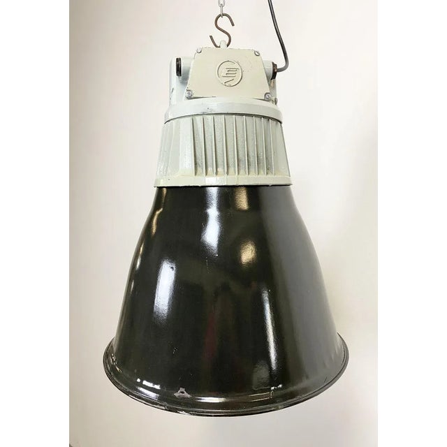 - Industrial hall lamp - Manufactured by Elektrosvit - Produced in former Czechoslovakia during the 1960s - Black enamel...