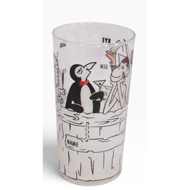 Pair of Mid Century vintage barware drinking glasses, depicting a Monkey, Gull, Poodle, and a Penguin enjoying a cocktail....