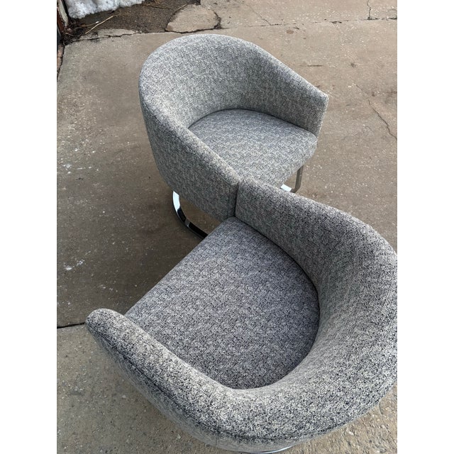 Pair of cantilevered Barrel Chairs, believed to by Pace. Very nice quality with stainless legs. Newly reupholstered and...