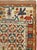 An antique Persian Kurd Bidjar throw rug. Not quite a sampler (wagireh), this village Bidjar Kurdistan scatter has a...