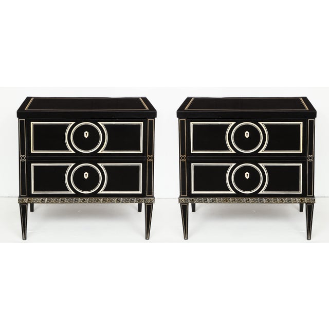 Bespoke Pair of Ebonized Commodes featuring Neoclassic Hand-painted Decoration in Graphic Black and White. Reminiscent of...