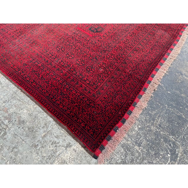 The Afghan Turkoman rug is hand-knotted and 100% wool, This Afghan Turkoman rug will enhance your home's style. This rug...