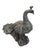 This striking vintage peacock statue is a testament to classic garden artistry, likely crafted from heavy cast iron or...