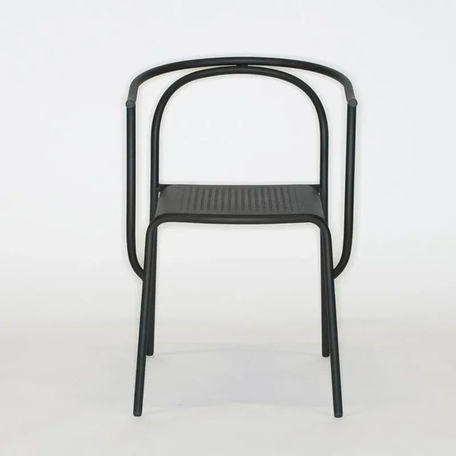 The Giardini chair is a light, elegant, and stackable option for the outdoor caf&eacute; or private garden. The friendly...