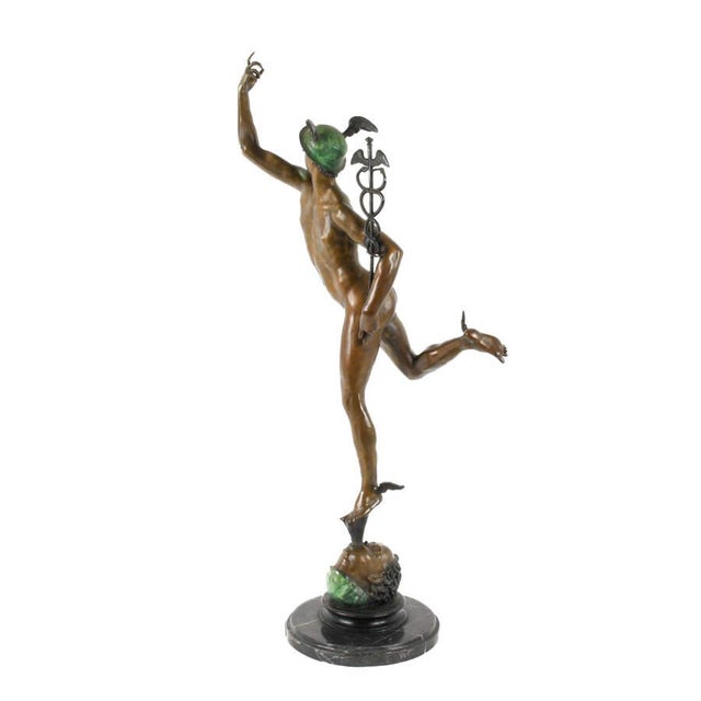 This elegant bronze sculpture represents Mercury (Hermes), the Roman messenger god, shown in his iconic flying pose...