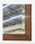 Small in scale. Very much not small in character. Sourced in France, this petite antique mirror dates to the late 19th...